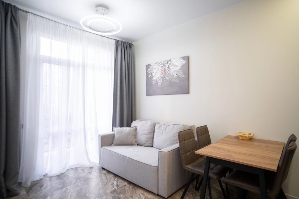 Отель Апартаменты Red Apartments Арт Лайт Сити Моне в Сириусе