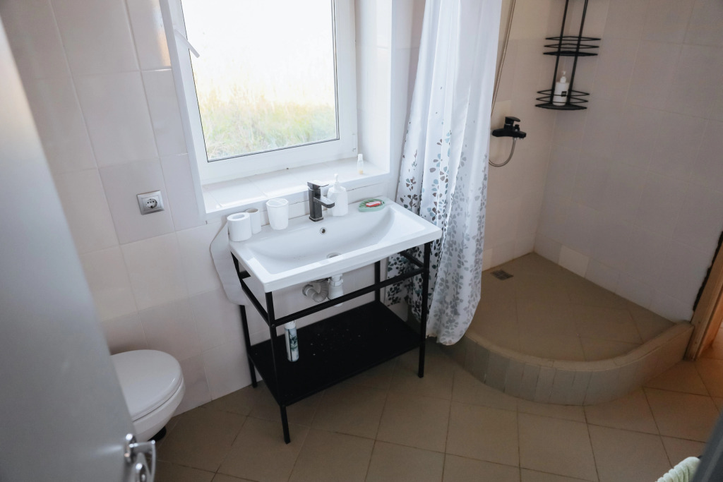 Двухместный коттедж с 3 комнатами с красивым видом из окна двуспальная кровать в Банный остров