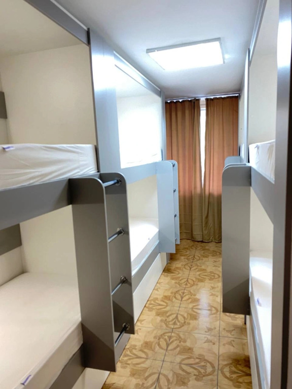 Кровать в общем номере (мужской номер) в Арктика