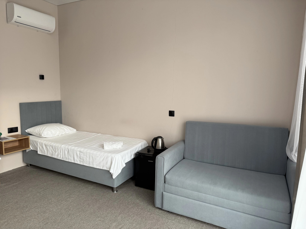 Трёхместный номер Superior с балконом в Sandro&Milanii