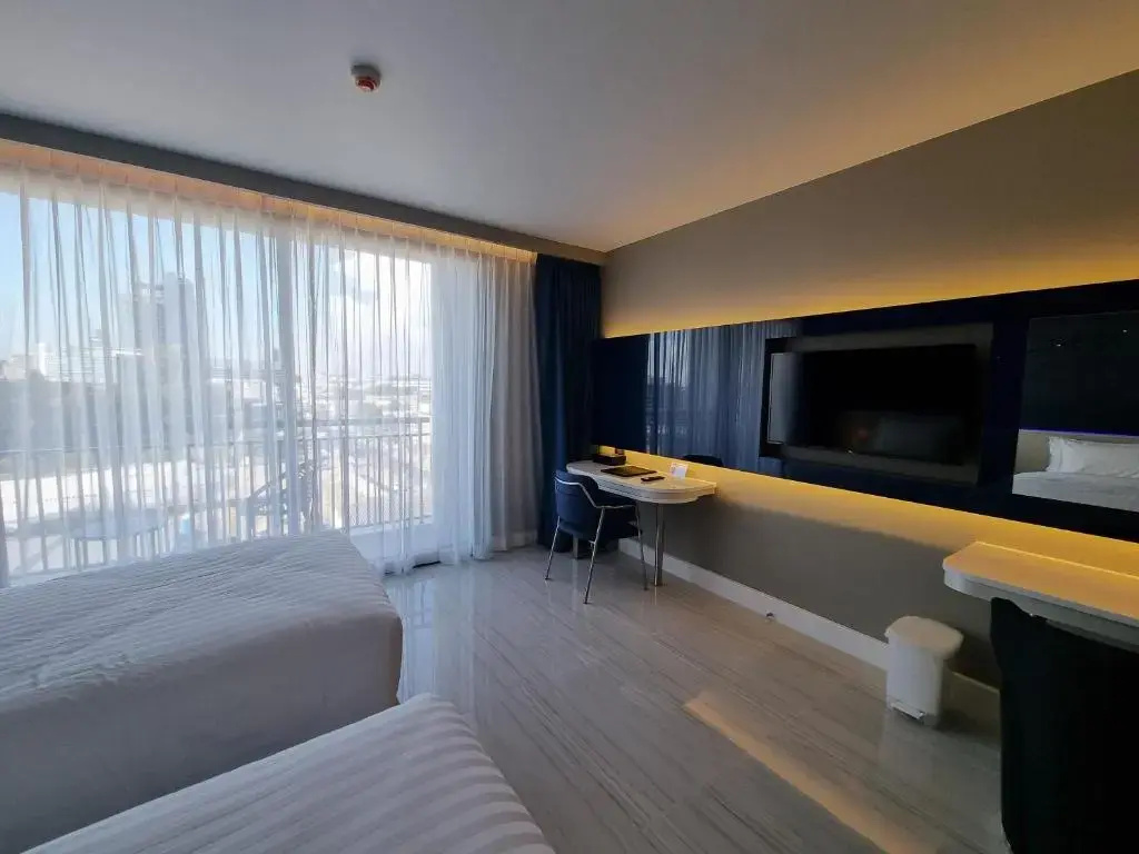 Pattaya Discovery Beach Hotel - Chambres