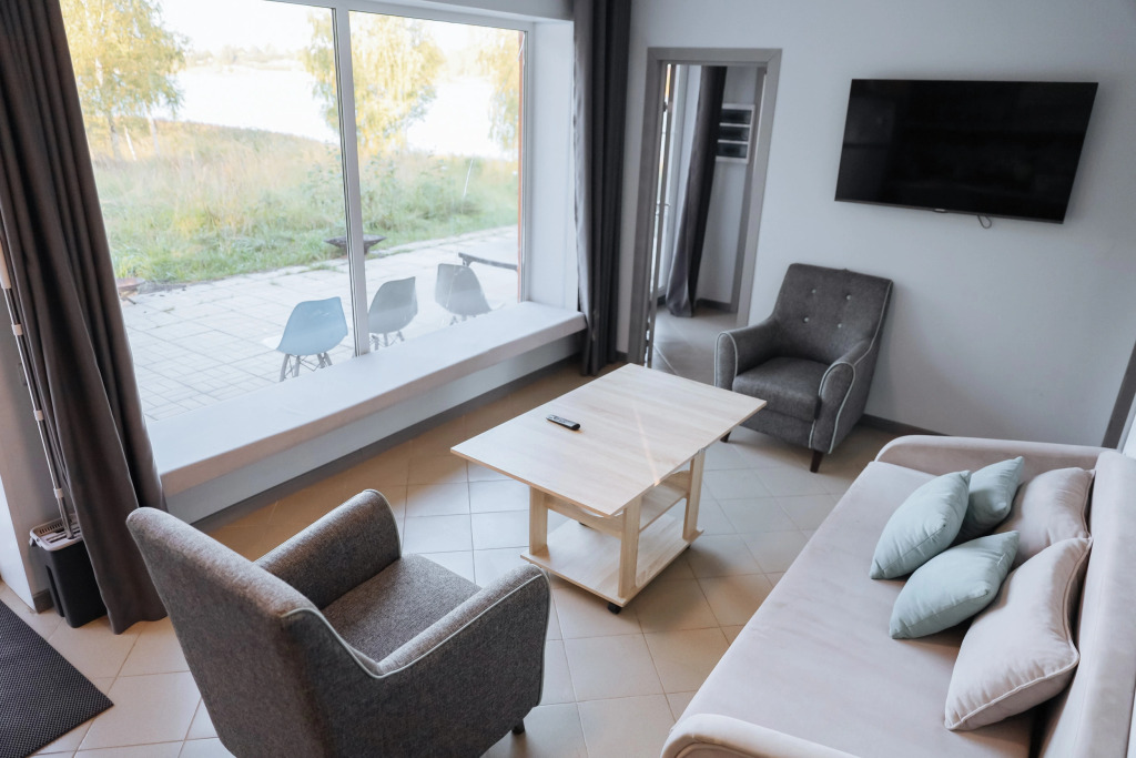 Двухместный коттедж с 3 комнатами с красивым видом из окна двуспальная кровать в Банный остров