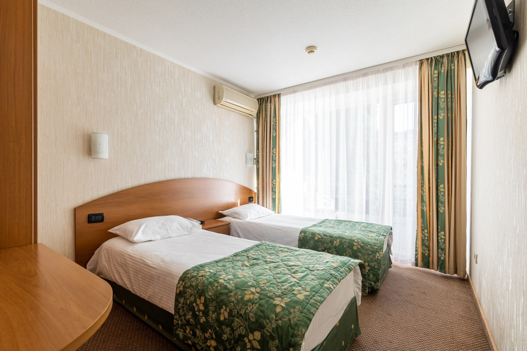Magnoliya Hotel Room Type - Standard Double room with balcony and with city view twin beds