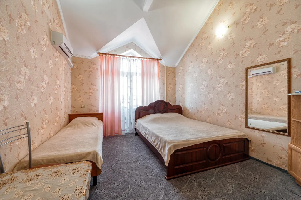 Standard Triple room with balcony and with courtyard view