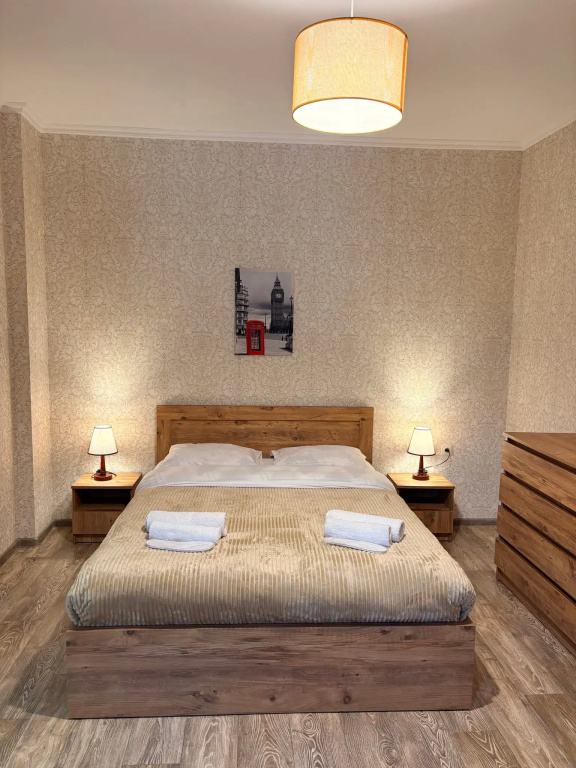 Two-bedroom family apartment for four guests with one large bed and two sofa beds Apartments