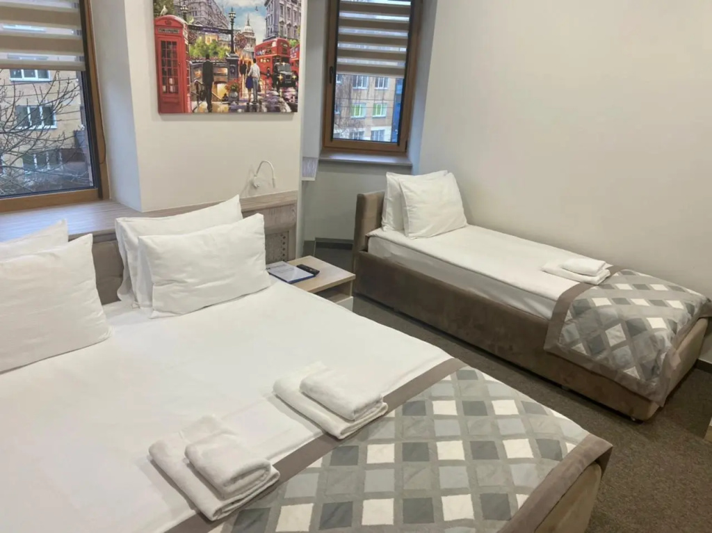 Sherlok Hotel Room Type - Standard Triple room