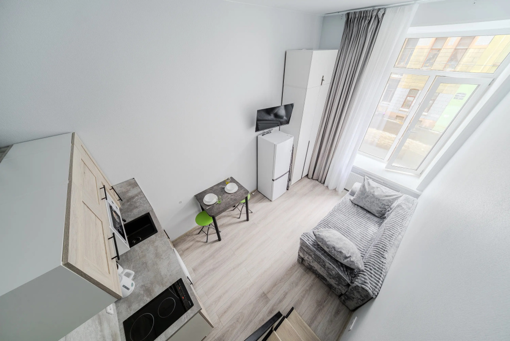 Апартаменты Дизайнерские двухуровневые расположены в самом центре города — фото