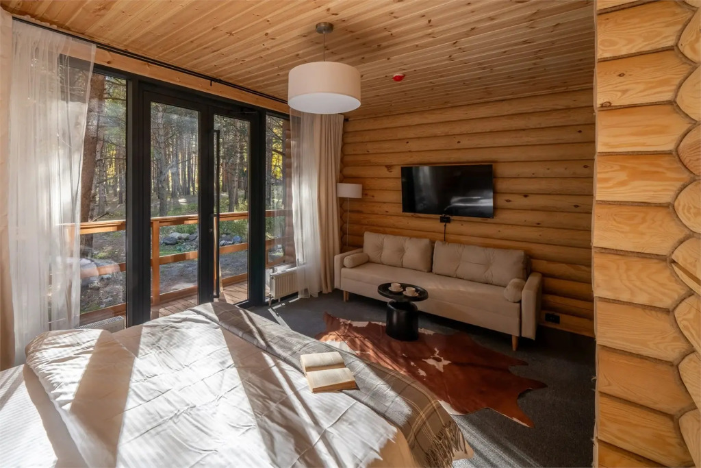 Двухместный люкс двуспальная кровать в Skazka Lodge