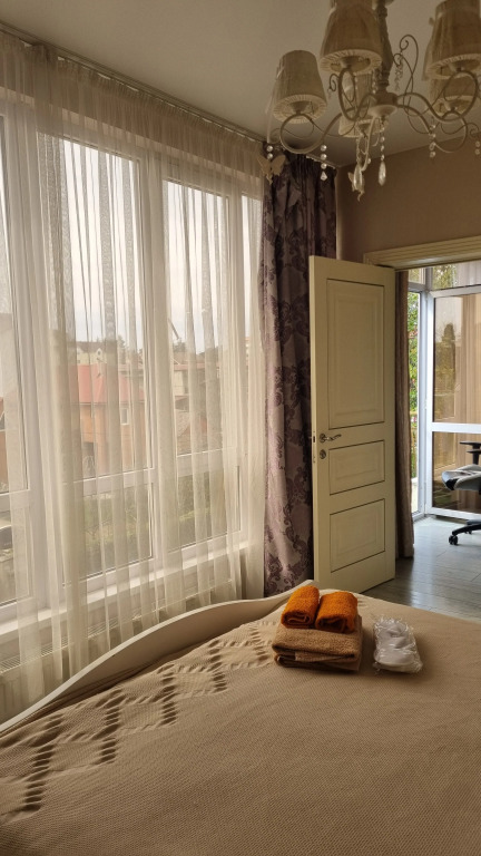 Апартаменты с балконом и с красивым видом из окна в У дяди Володи