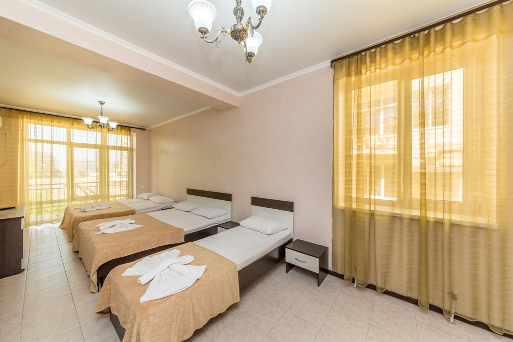 Standard Quadruple room with balcony and with view