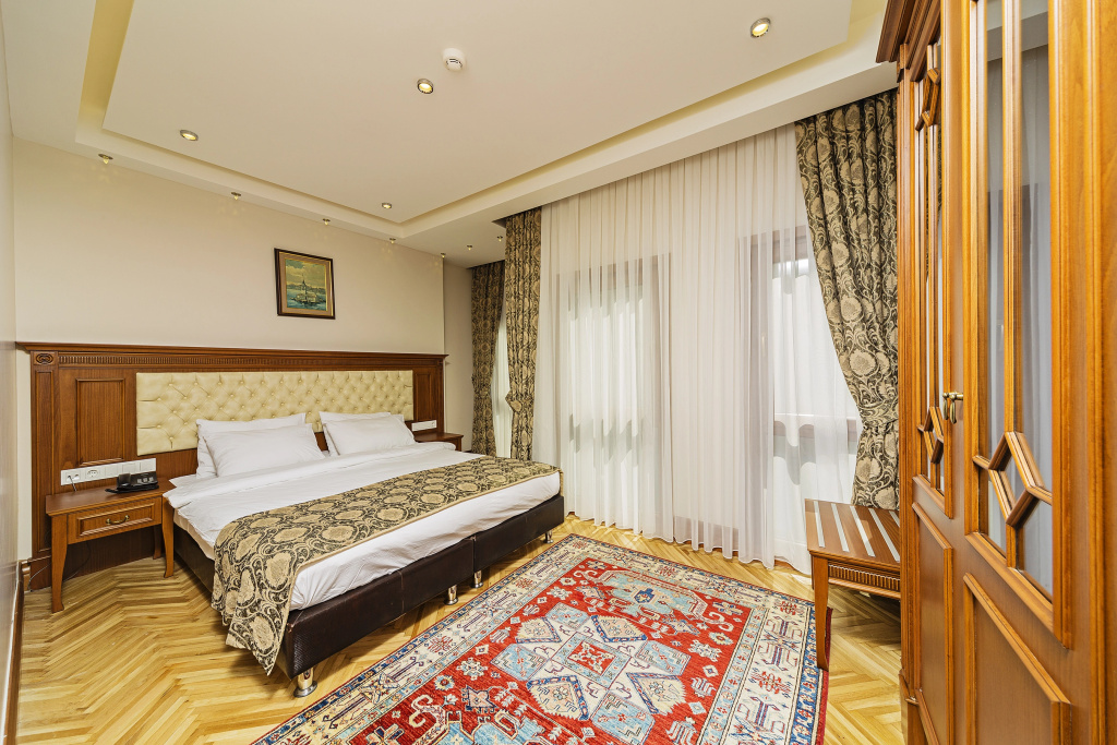 Spectra Hotel - Chambres