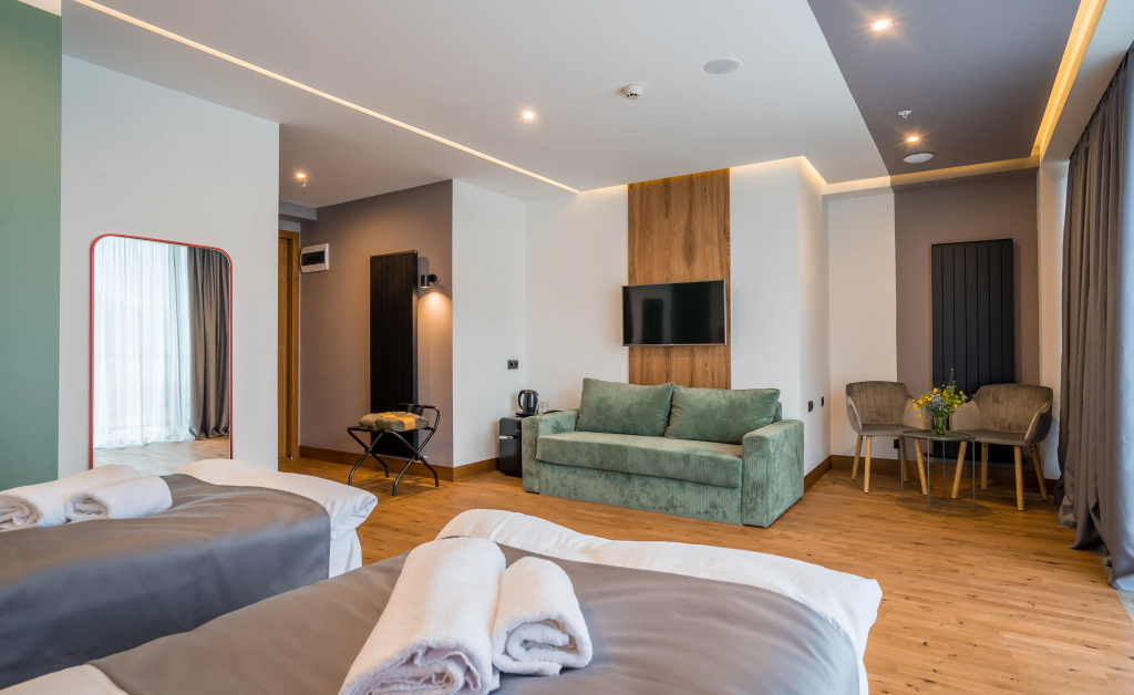 Deluxe Quadruple room with balcony and with mountain view
