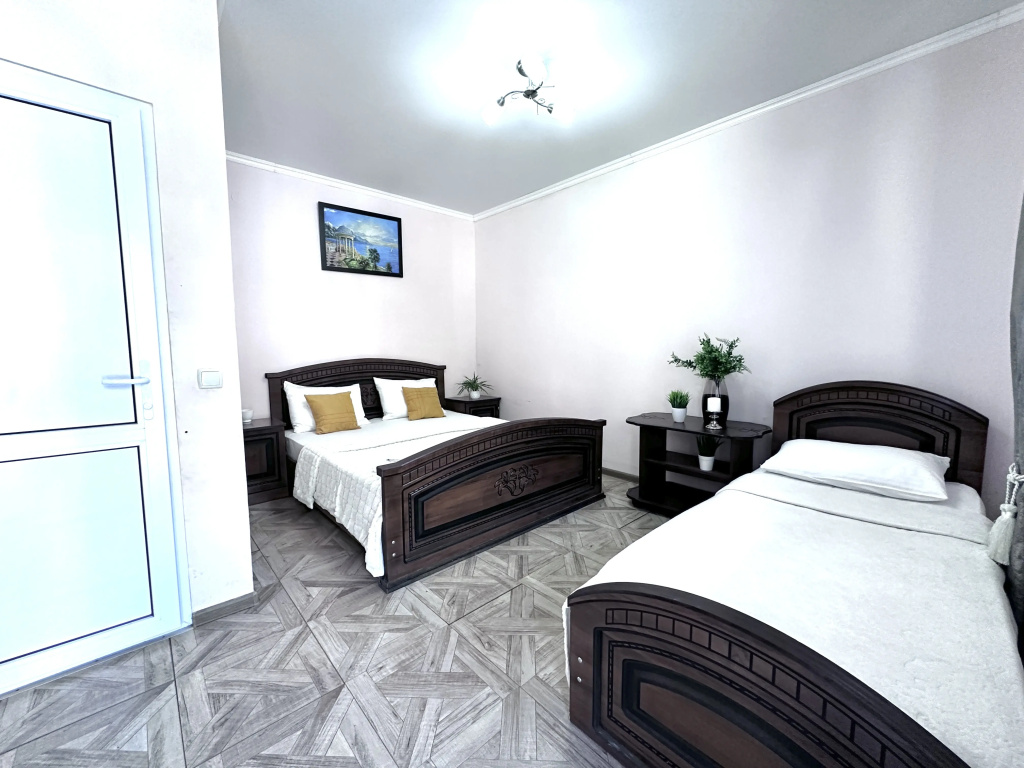 Standard Triple room with balcony and with courtyard view
