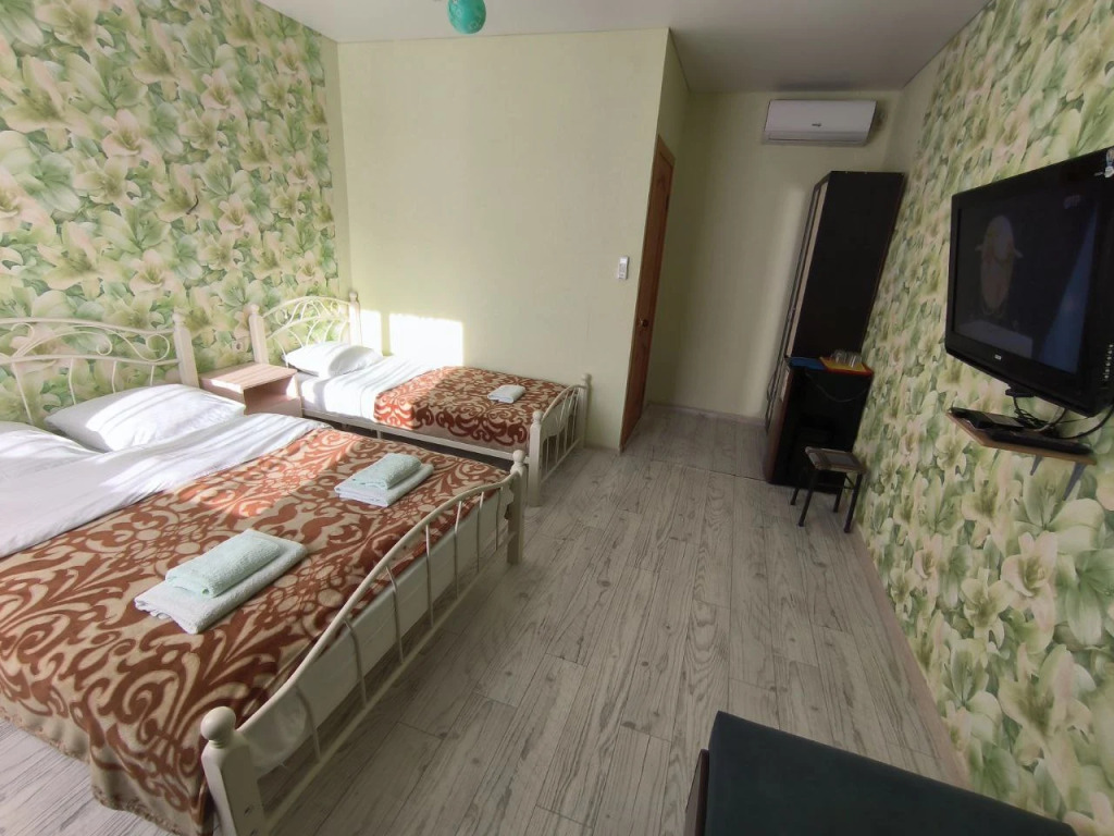Трёхместный номер Deluxe рядом с пляжем в Sea Breeze