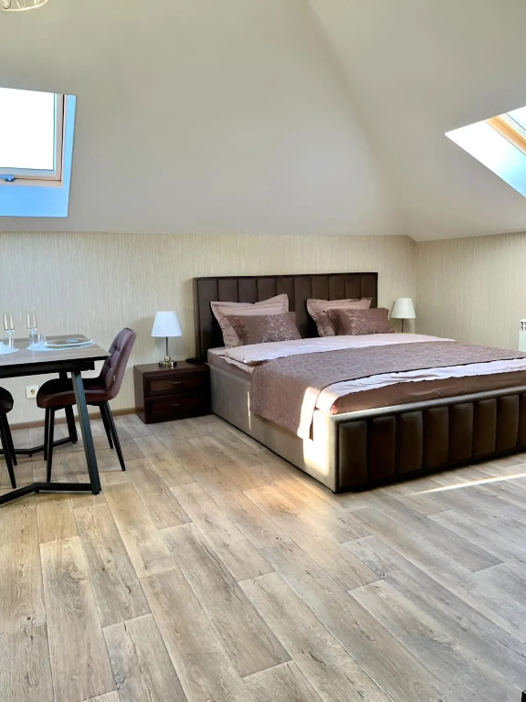 Студия Мансарда в Eva Apartments