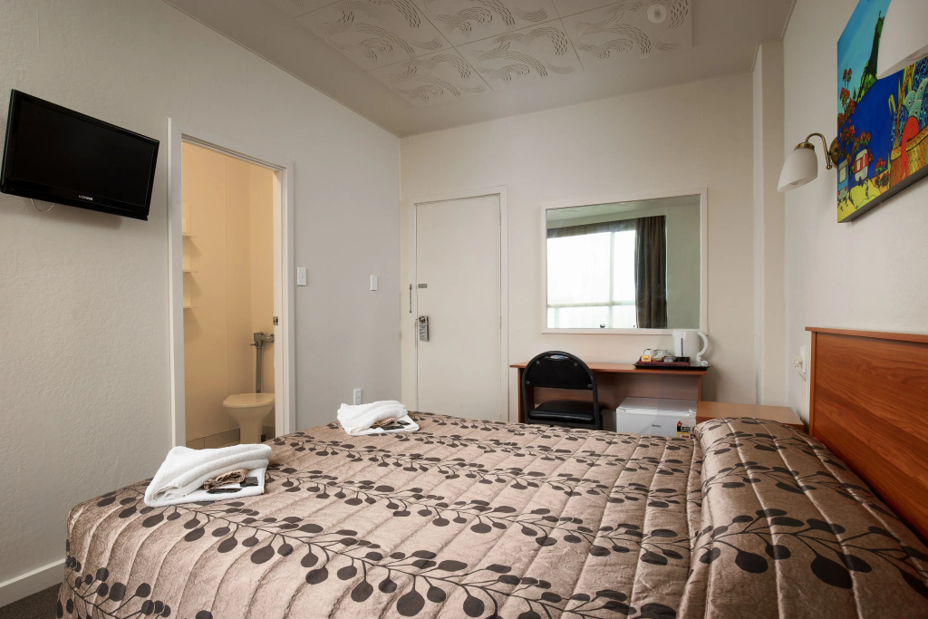 Kiwi International Hotel - Chambres