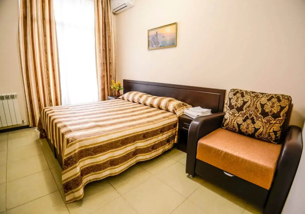 Deluxe Triple room with balcony