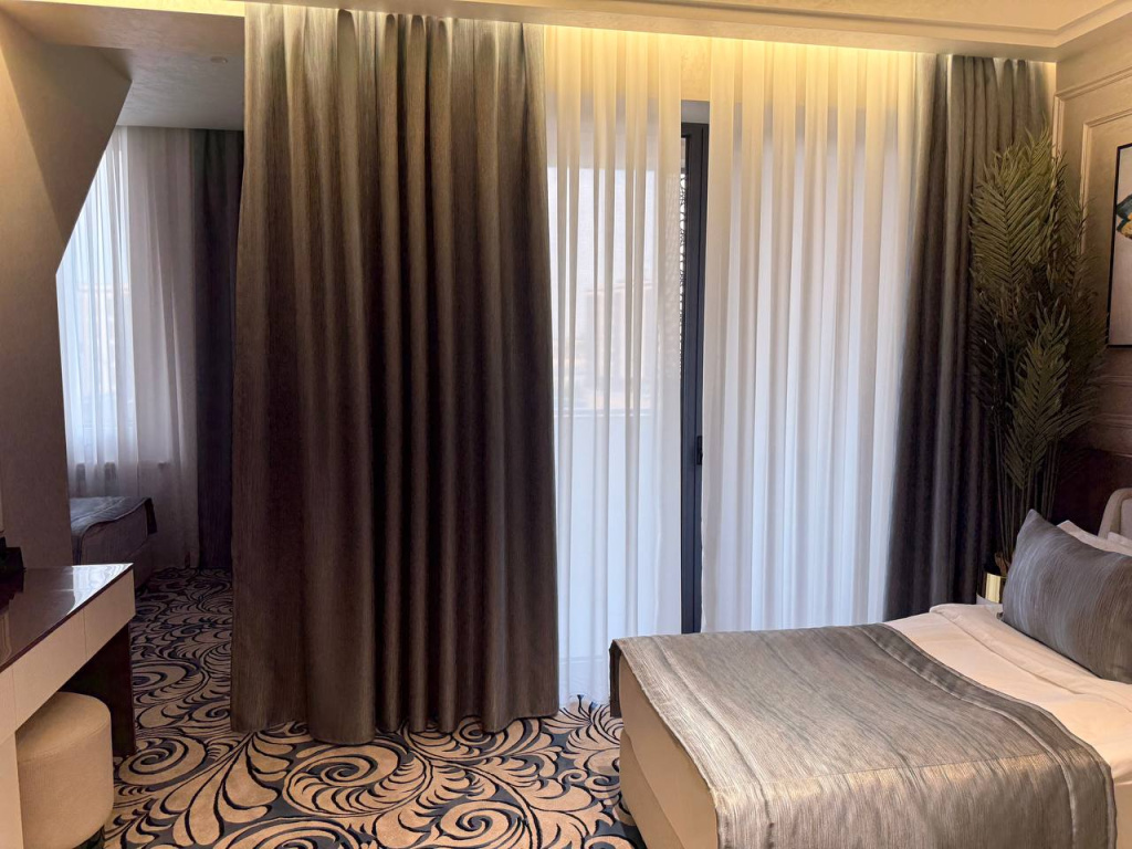 Double Suite with balcony and with city view (full double bed)