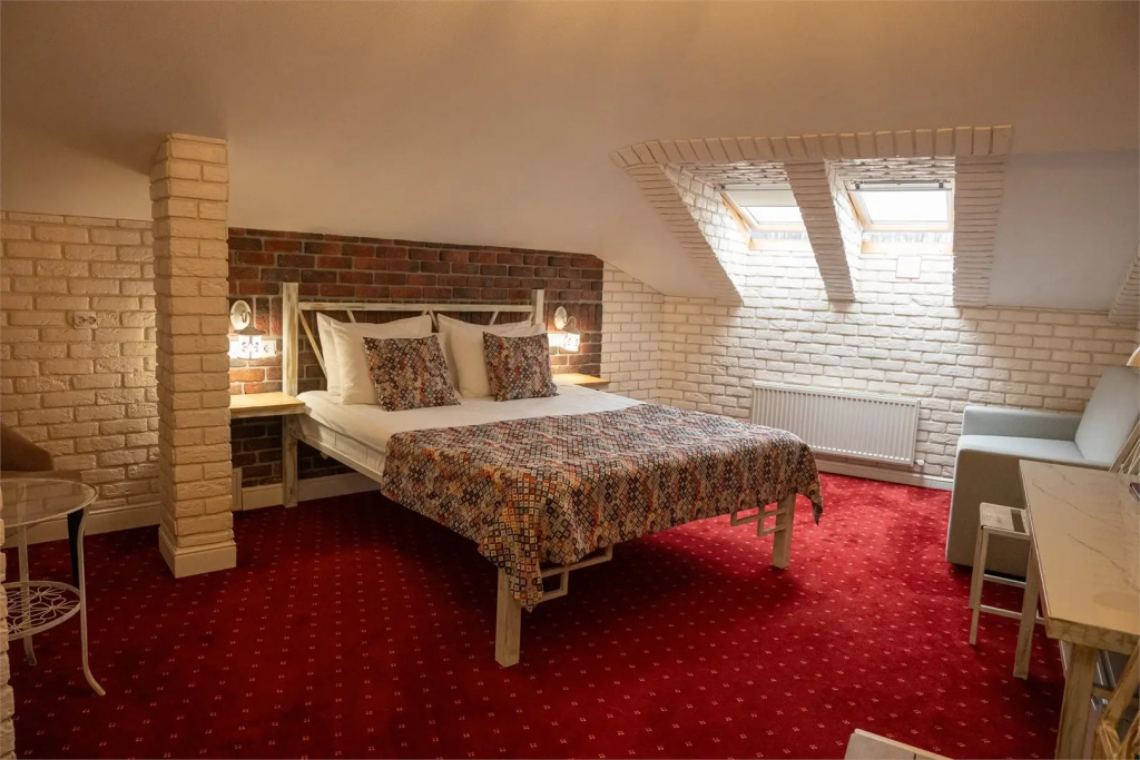 History Hotel Room Type - Double Attic Junior Suite full double bed