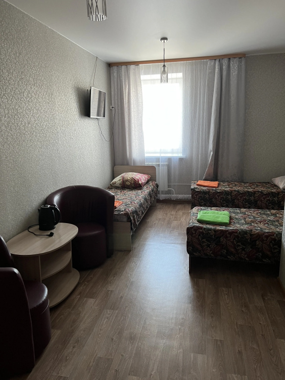 Standard Triple room with courtyard view
