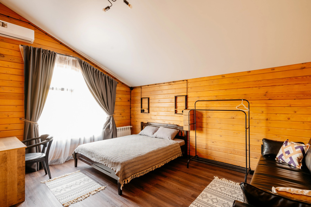 Четырёхместный коттедж Deluxe в Винни-Вилла