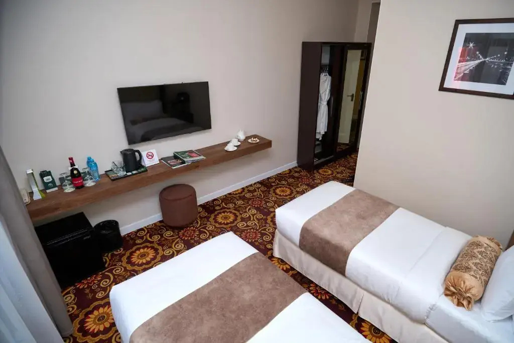 Garden Hotel - Chambres