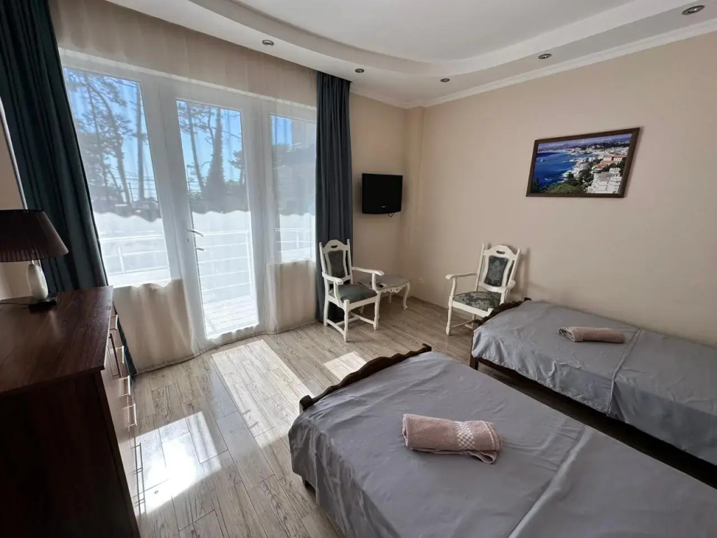 Standard Quadruple room with balcony and with sea view
