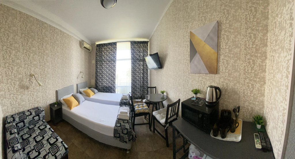 Standard Triple room with balcony and with sea view