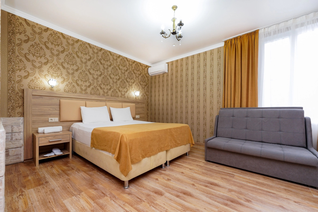 Comfort Quadruple room with balcony and with sea view