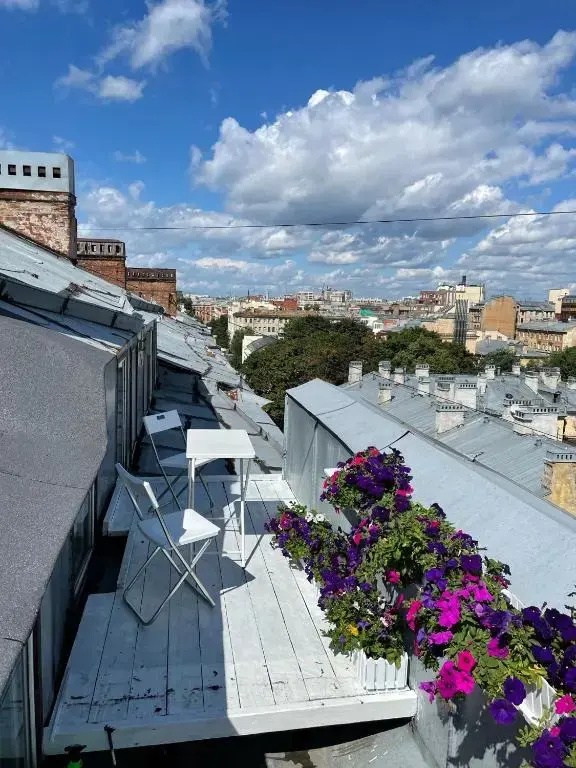 Уютные апартаменты с выходом на крышу — фото