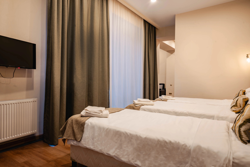 Hotel Bakuriani Inn - Chambres