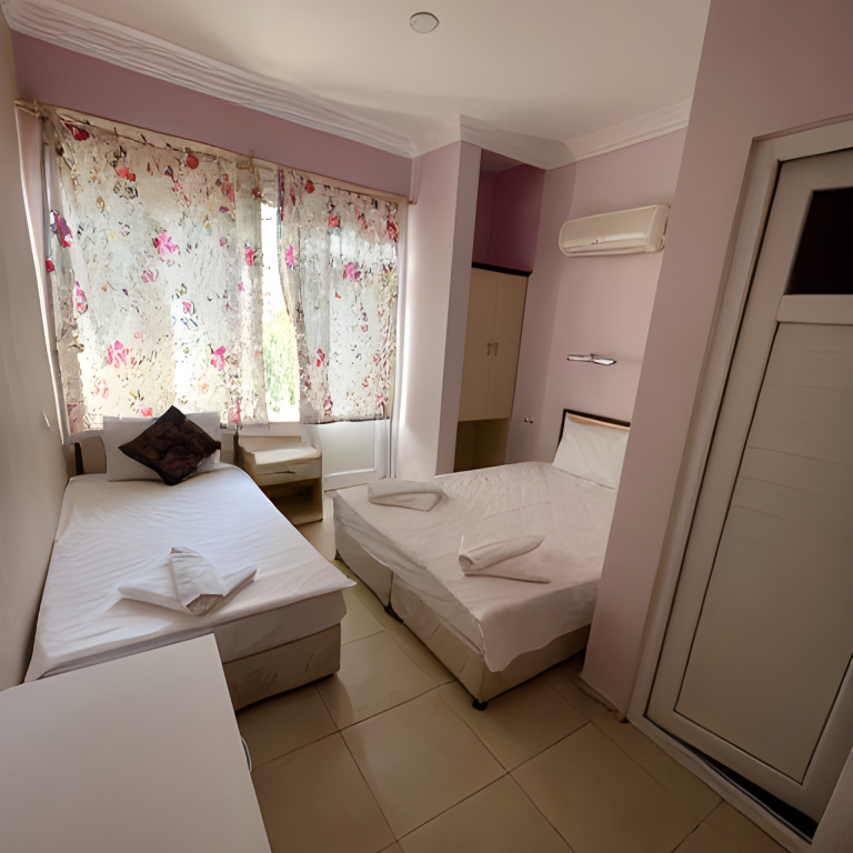 Economy Triple room with balcony and with city view