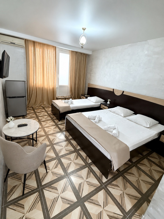 Standard Triple room with balcony