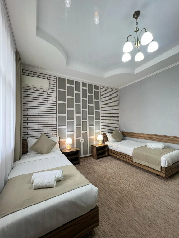 Kausar. Hotel - Chambres