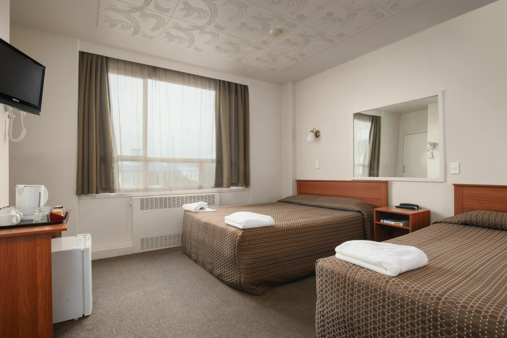 Kiwi International Hotel - Chambres