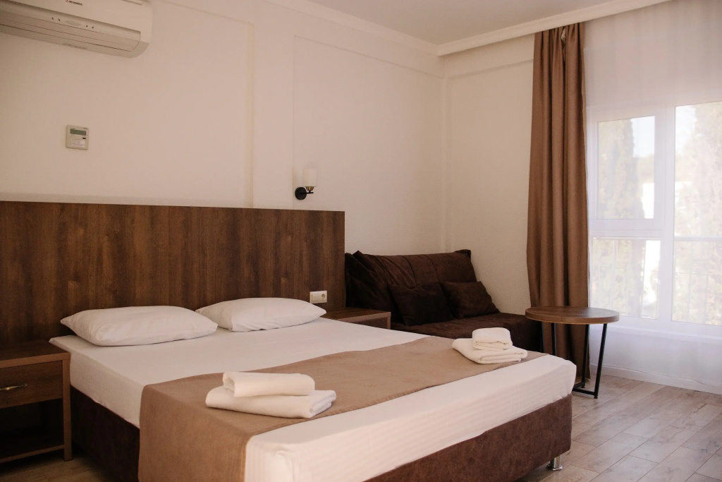 Deluxe Triple room with balcony and with mountain view