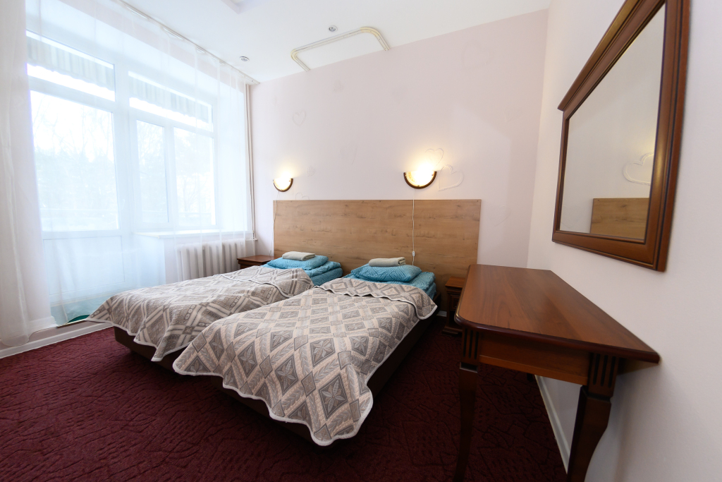 Двухместный номер Семейный Эконом 2 отдельные кровати в Вкс