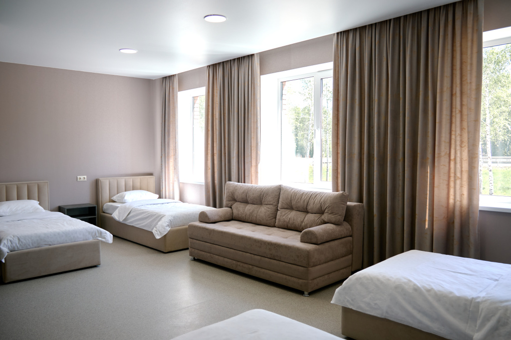 Standard Quadruple room with courtyard view
