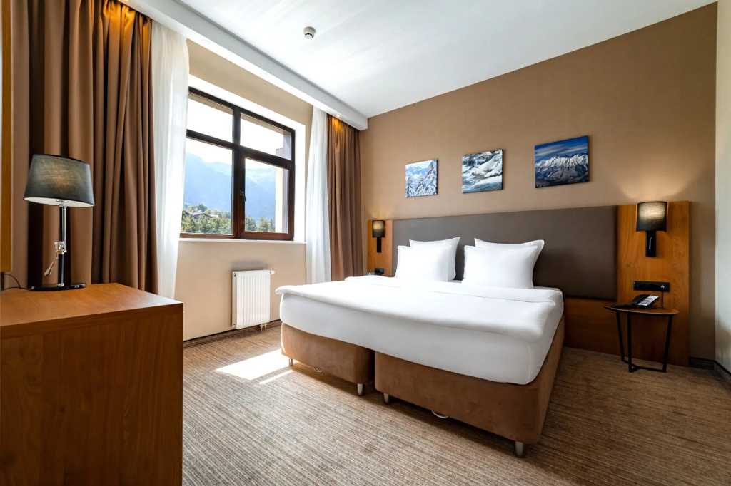 Ski Inn SPA Hotel Rosa Khutor Room Type - 2 Bedrooms Double Family Suite with balcony and with mountain view full double bed