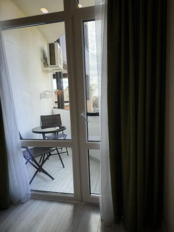 Апартаменты с балконом и видом на море - фото 6