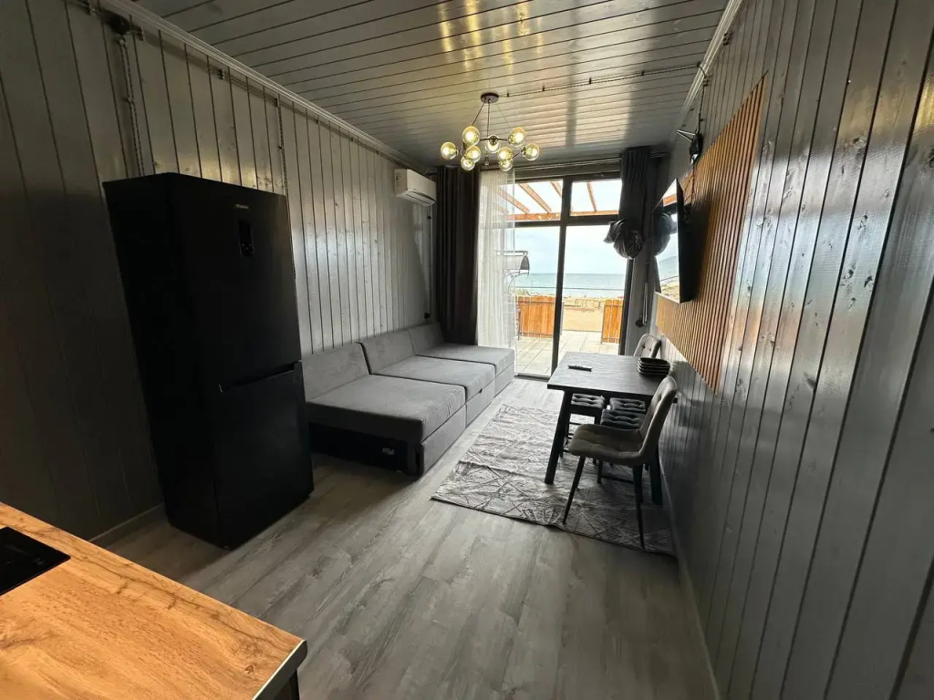 Wooden 6th Row Quadruple House by the Sea