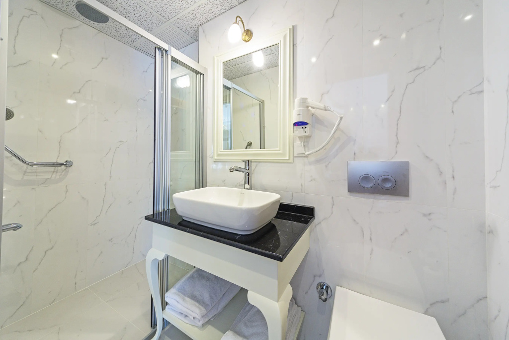 Spectra Hotel - Chambres