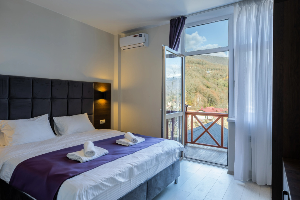 Atmosphere Guest House Room Type - Standard Double room with balcony and with mountain view full double bed
