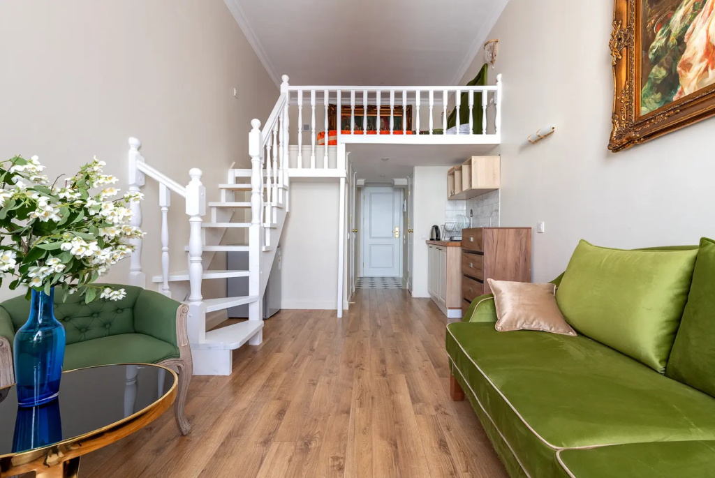 Апартаменты Легенды Невского Проспекта BookingSPB Музыкальная гостиная с видом на Дом Зингера — фото