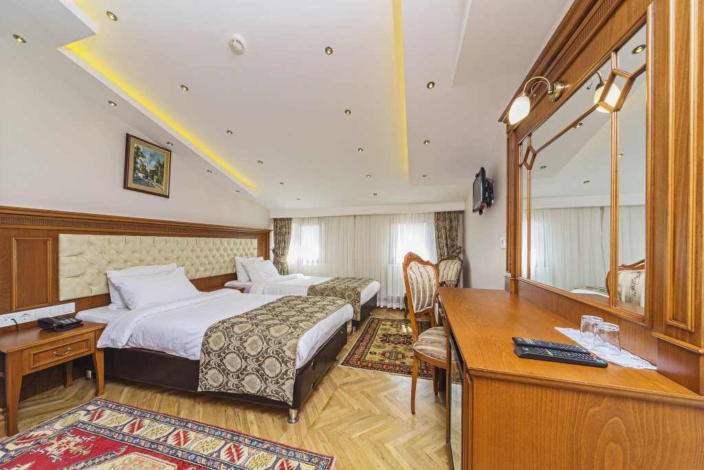 Spectra Hotel - Chambres