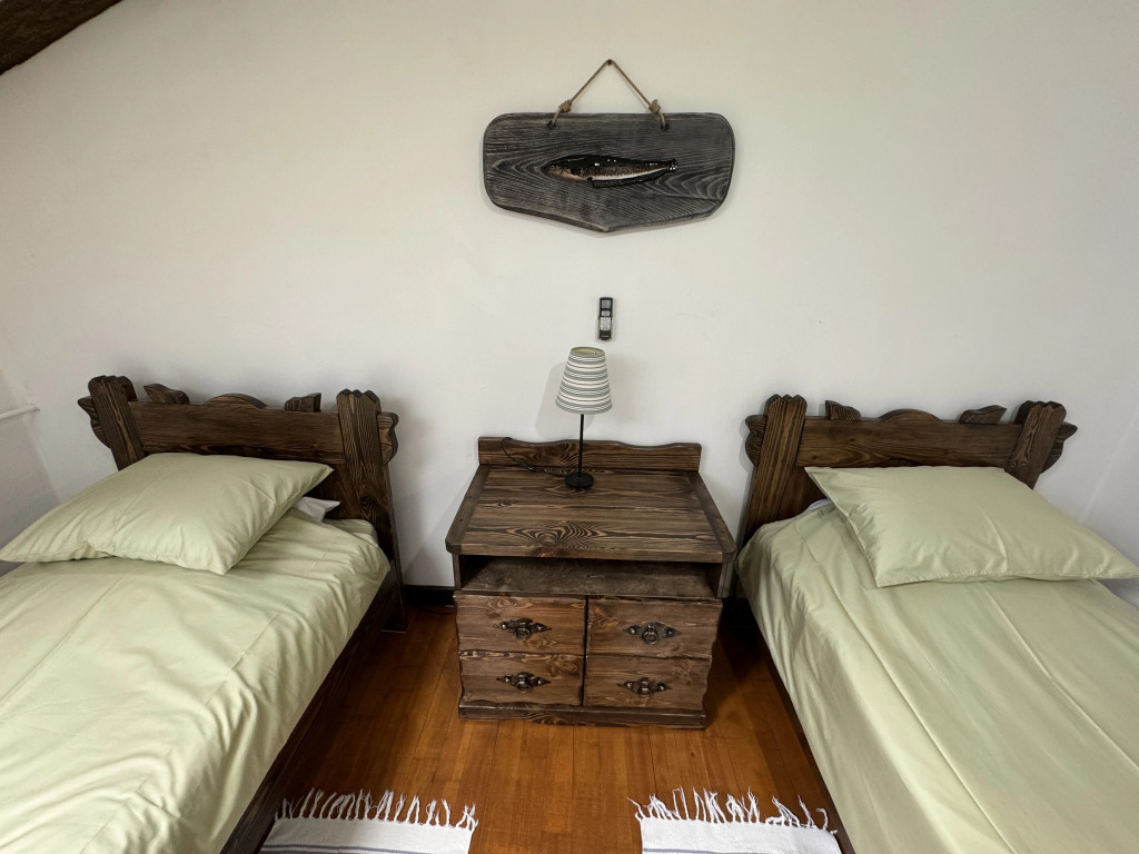 Двухместный номер Standard Мансарда 2 отдельные кровати в Rybinka