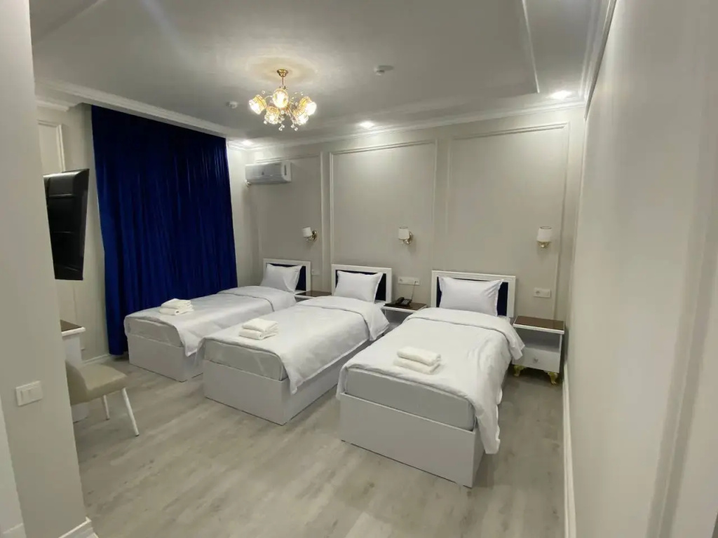 Economy Triple room with balcony