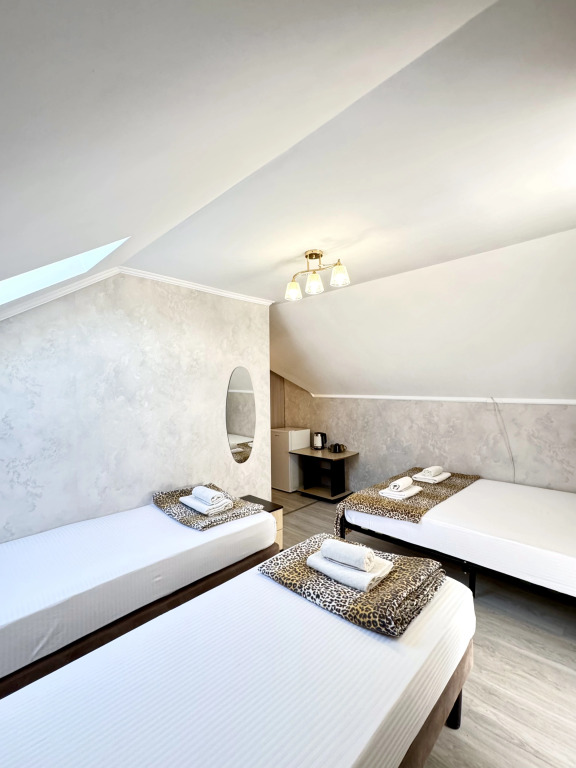 Четырёхместный номер Classic с балконом в Ольга