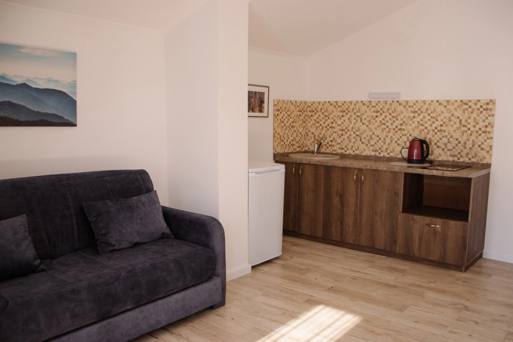 Четырёхместные апартаменты с 2 комнатами с балконом и с видом на море в Талион