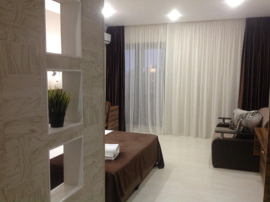 Standard Quadruple room with balcony and with view